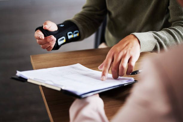 Injured person consulting a personal injury lawyer to understand legal rights after an accident.