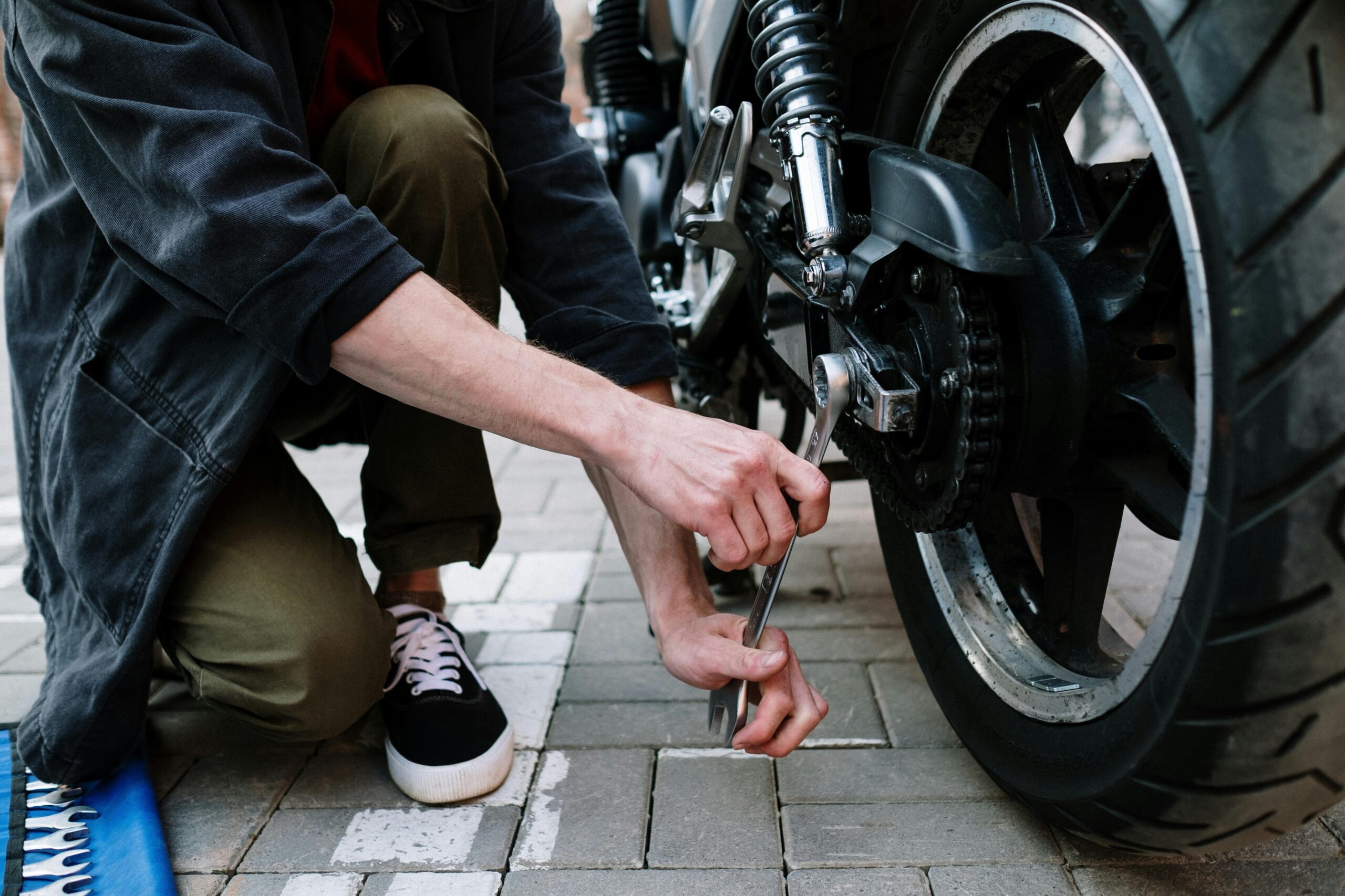 Who Pays for My Bike Repairs After a Collision – damaged bicycle on the road after being hit by a car.